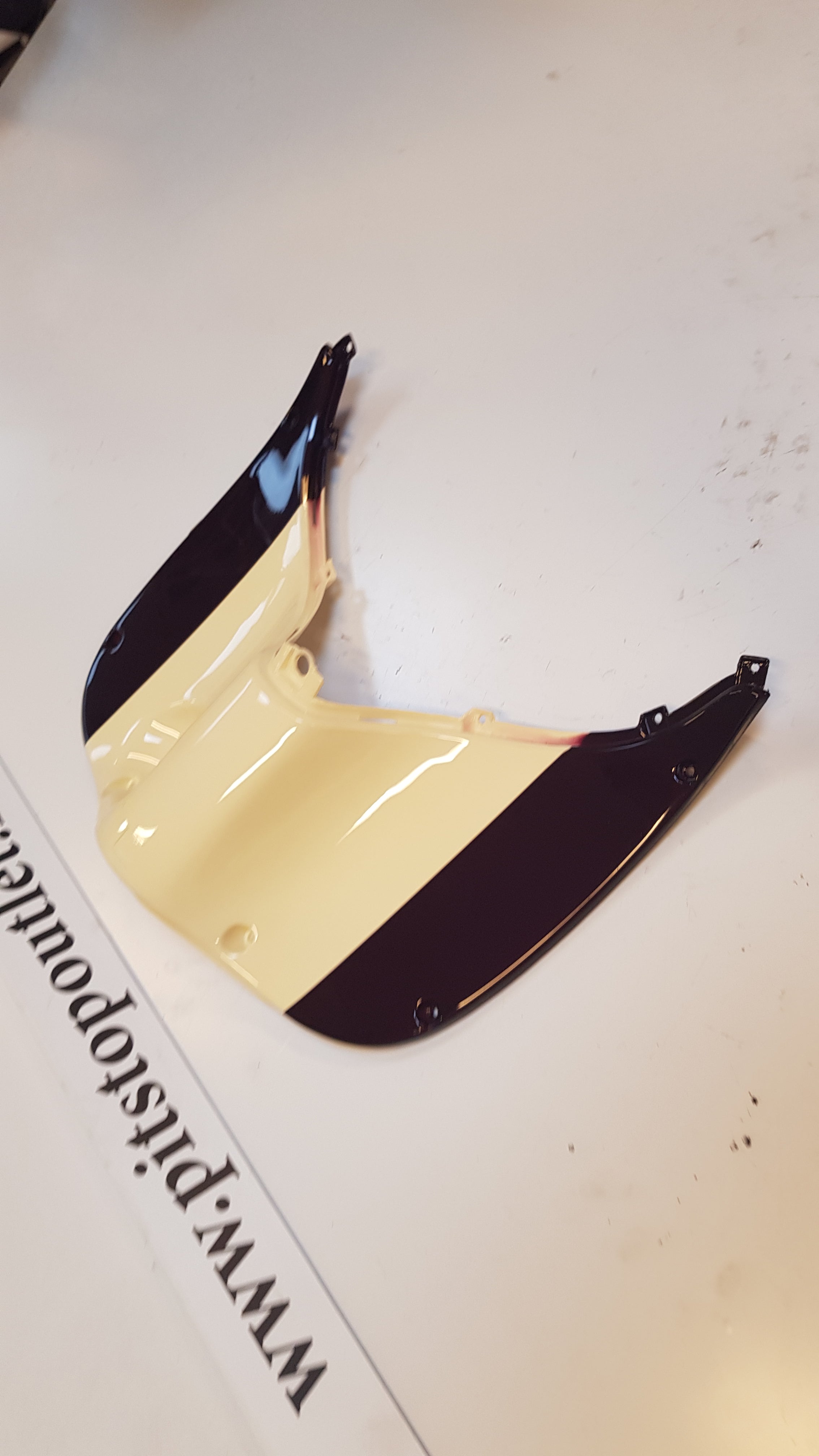 Beenschild (Aubergine/Creme)