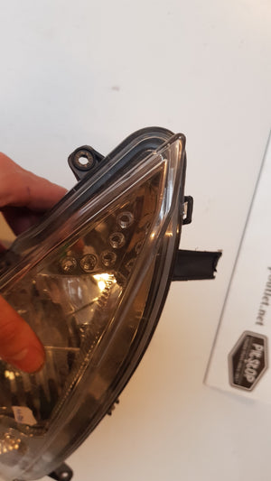 Linker Koplamp (Schade)