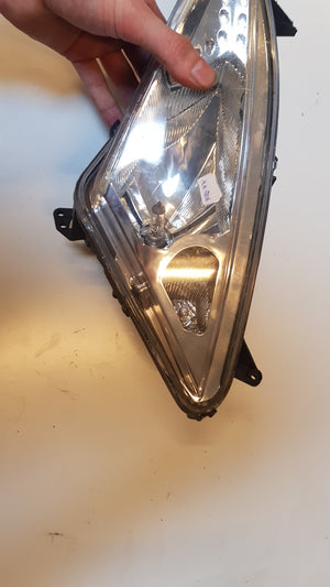 Linker Koplamp (Schade)