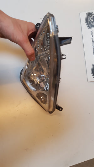 Linker Koplamp (Schade)