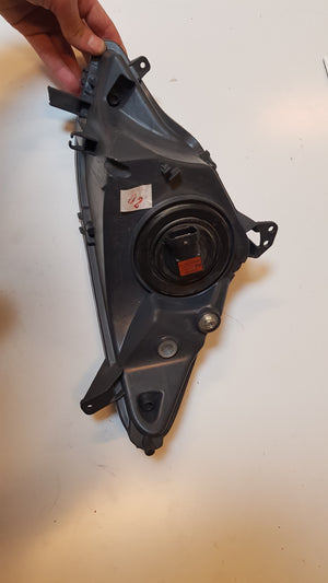 Linker Koplamp (Schade)